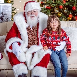 A SPECIAL VISIT WITH CARING SANTA from Santa Photo Experience at Penn Square Mall A Shopping Center in Oklahoma City OK A Simon Property